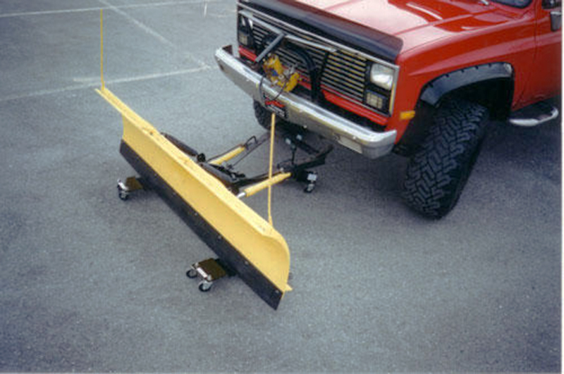 Another Pic of red truck with Standard Plow Dolly attached